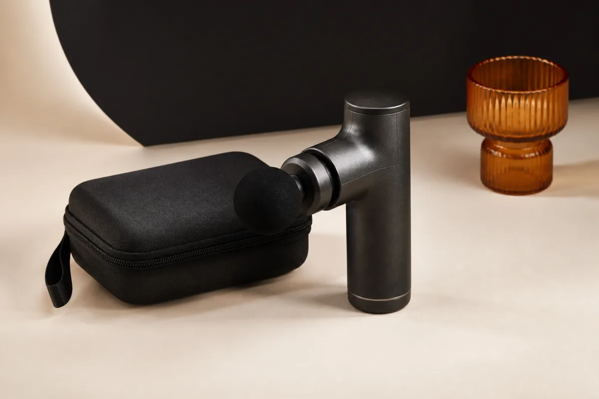 Portable massage guns shown as conference swag